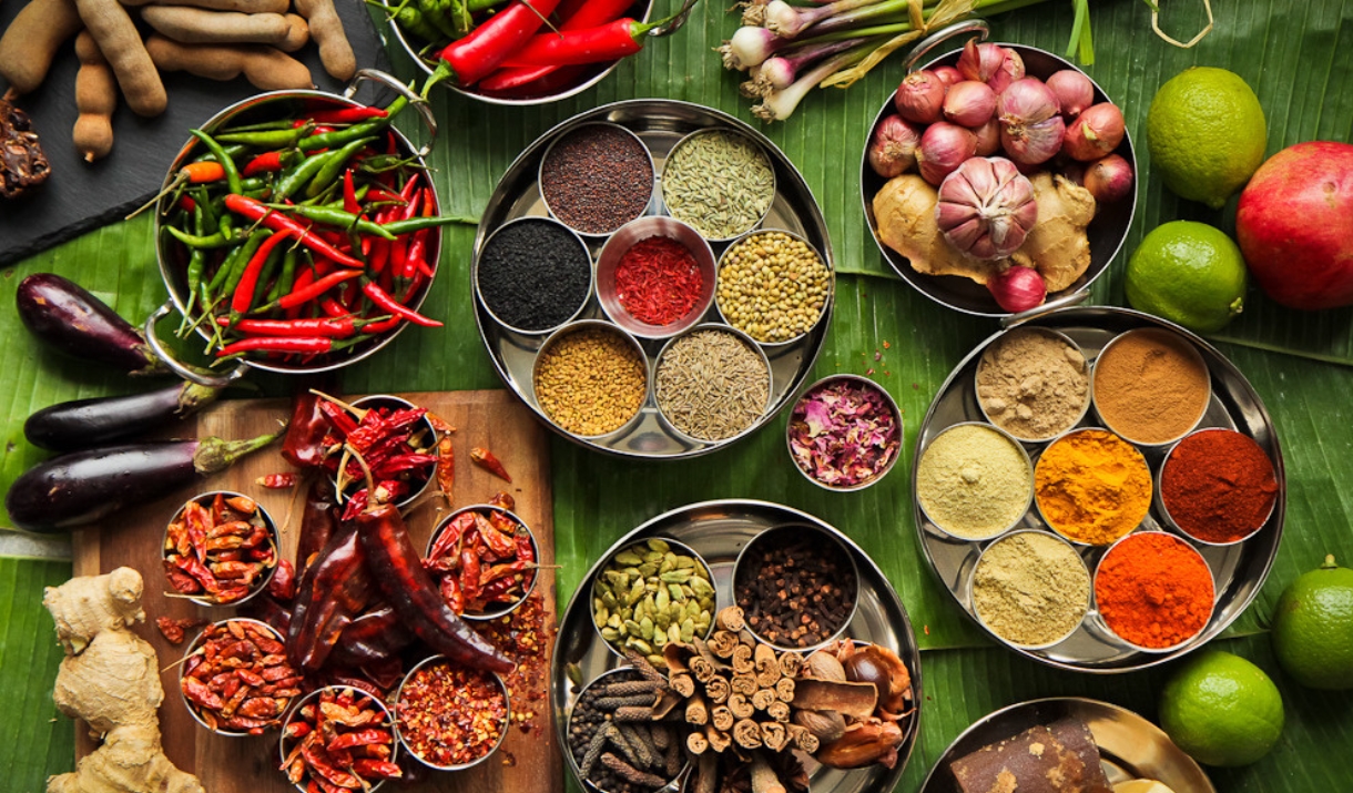 Assorted spices, dips, fruit, vegetables and other ingredients