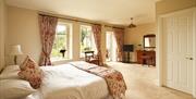 A bedroom at the Best Western Limpley Stoke Hotel