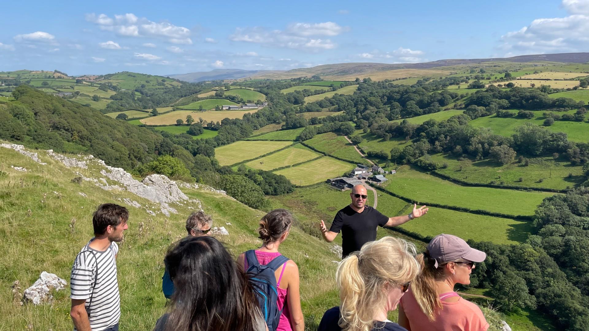 Galahad Tours with Green Hills in background