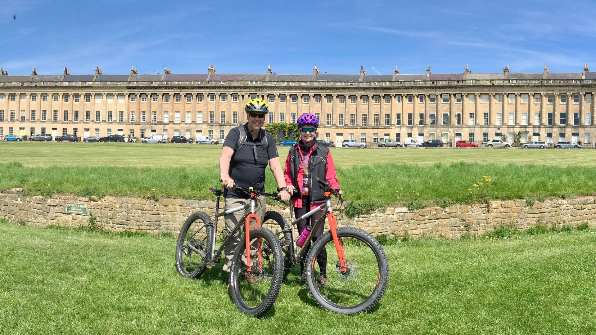 Couple with bikes at Royal Crescent