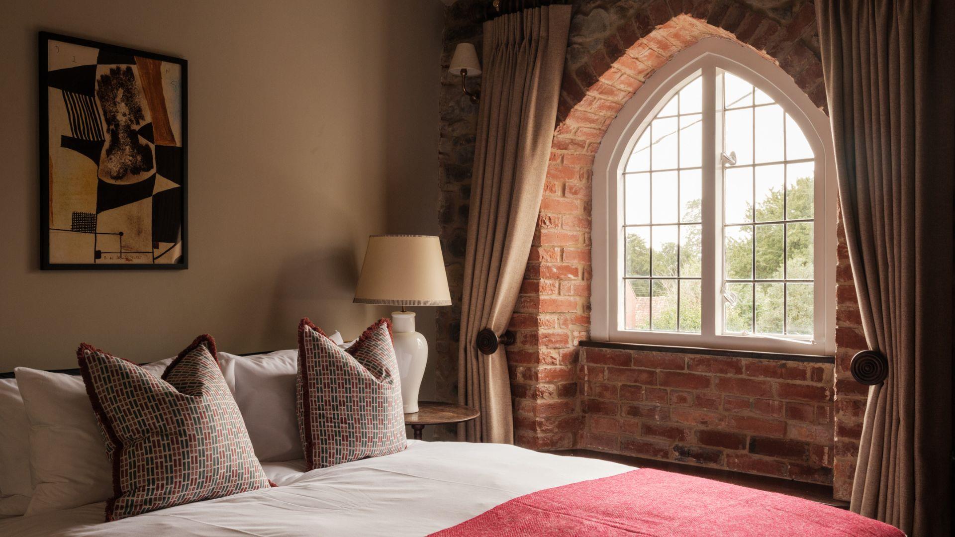 Bedroom and window at The Manor House Inn