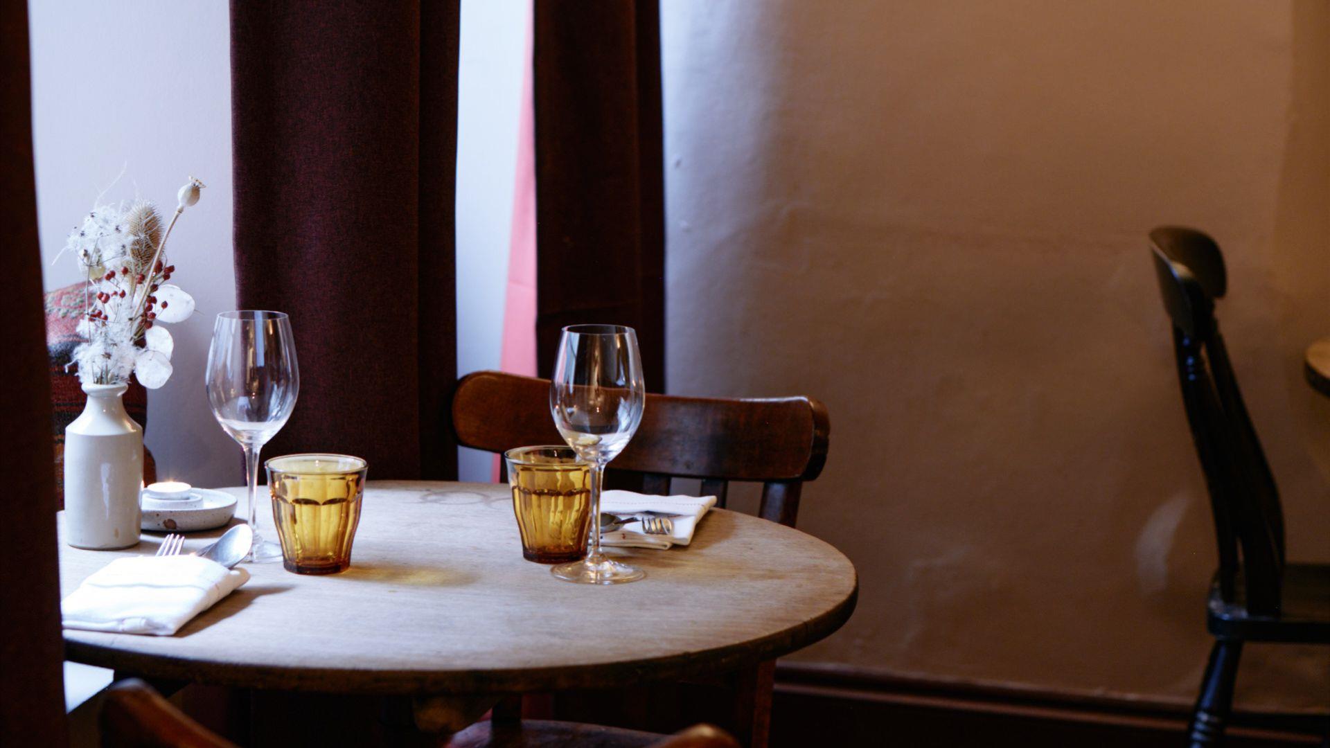 Table and chairs at OAK Restaurant in Bath