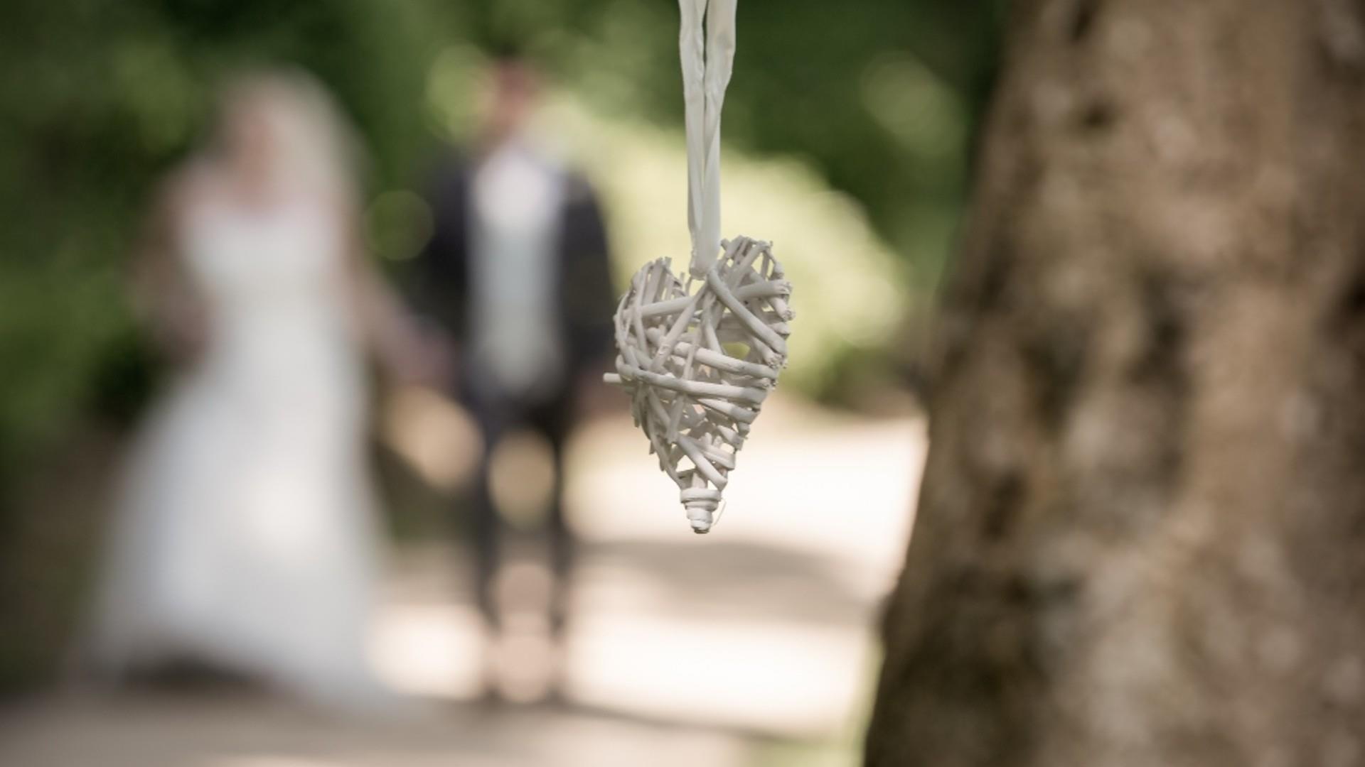 Wedding decoration in foreground with Bride and Groom in the background