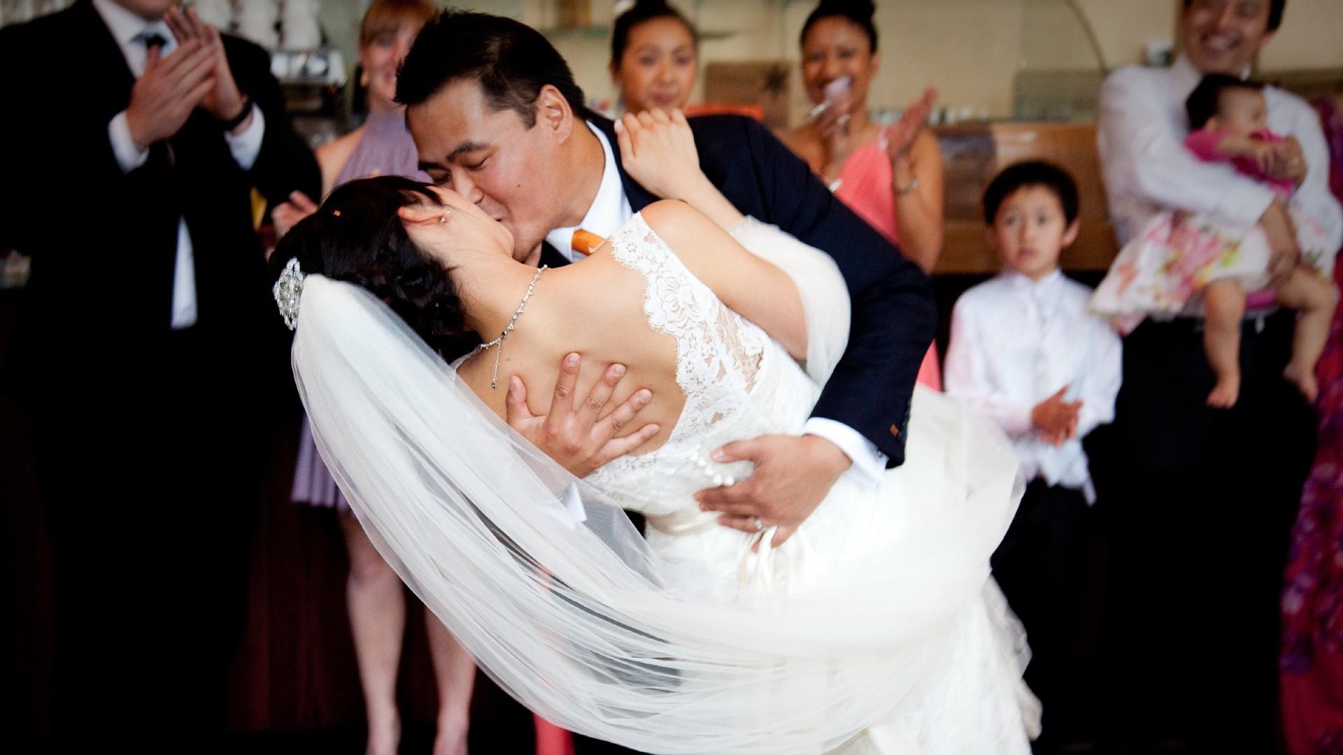 Bride and Groom kiss