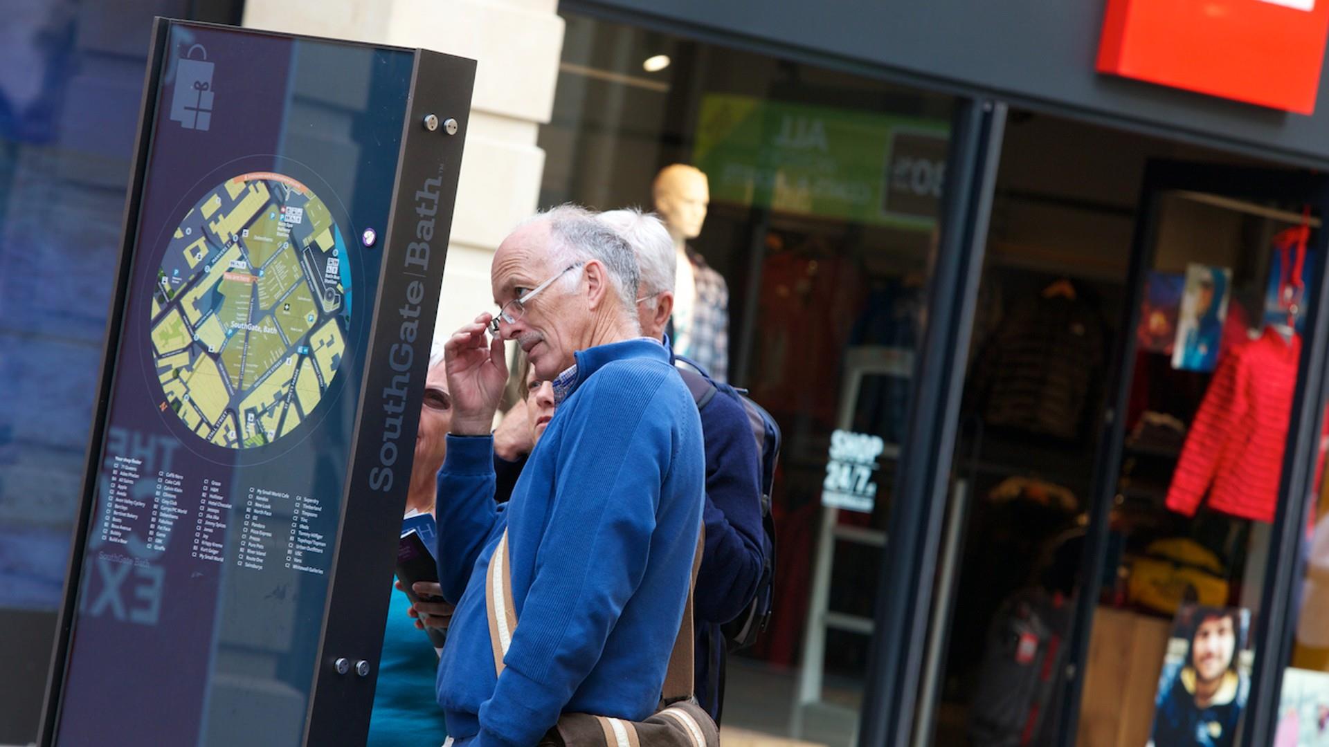 Man reads street map