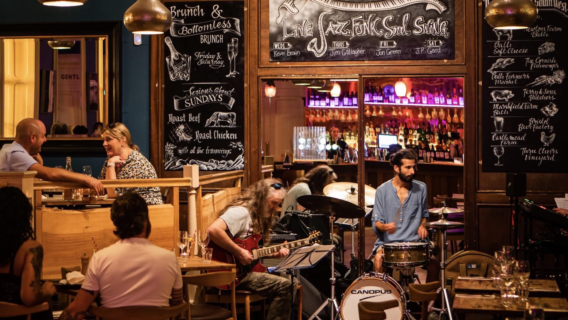 A band performing live music at Green Park Brasserie in Bath