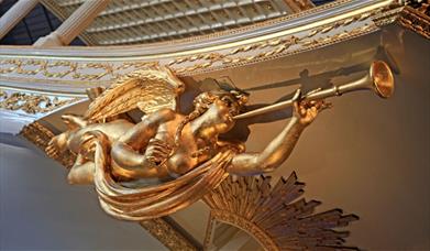 Gold baroque angel sculpture