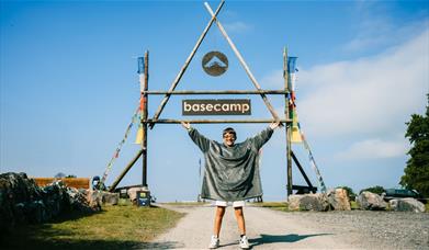 Person at the entrance to Mendip Basecamp