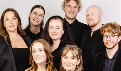 The Apex Singers all smiling