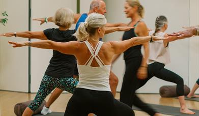 A yoga class at Combe Grove