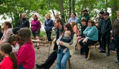 group of people gathered at outdoor event