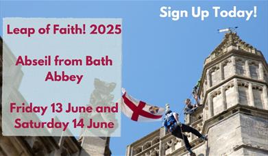 A man abseiling from the top of the Bath Abbey Tower. A flag is flying next to him. Details of the abseil event are also on the image.