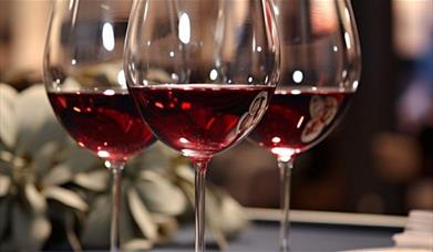 Three glasses of red wine