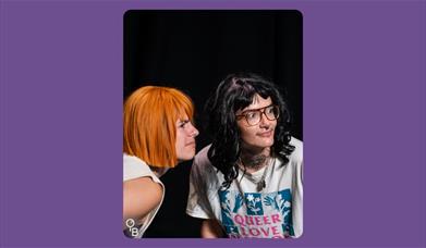 two trans mascs staring