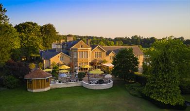 Exterior of the Homewood Hotel in Somerset at sunset