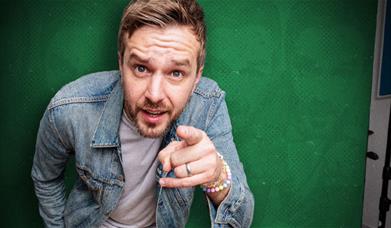 Iain Stirling pointing at the camera