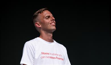 A photo of world Poetry Slam Champion Harry Baker