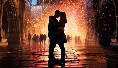 Poster image showing Romeo and Juliet silhouetted against a background of fireworks
