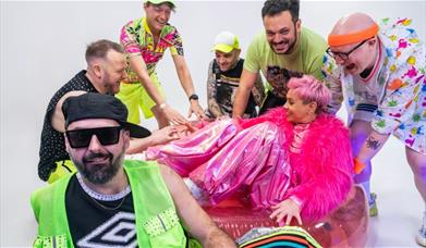 A photo of the band Rhythm Of The 90s