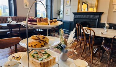Interior of the Tea Bar and a table set up for afternoon tea
