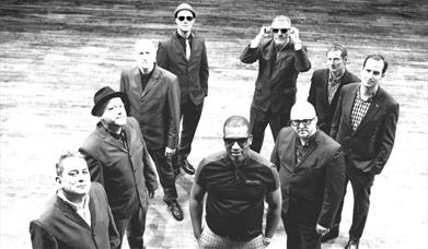 A Black and White photo of the Band The Specials Ltd