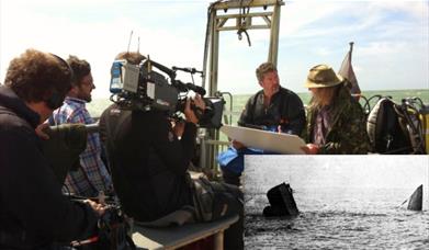 people being filmed on boat
