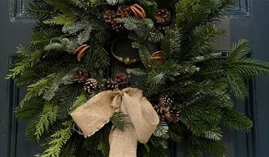 Wreath example hanging on a door