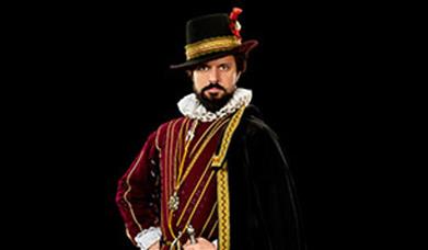 A man in Elizabethan clothing.