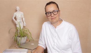 Women sat at a desk