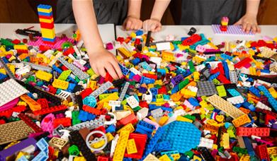 Child playing with building bricks