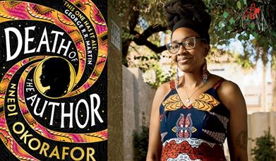 Nnedi Okorafor next to the cover of her book.