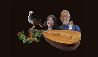 Jane Hunt and DIn Ghani with lute and partridge