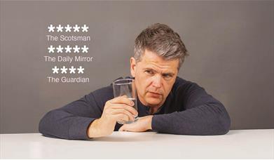 Photo of comedian Trevor Lock with 4 and 5 star media reviews