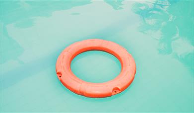 Orange rubber ring in pool