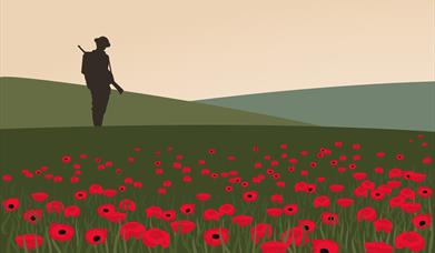 Soldier standing in a field of poppies