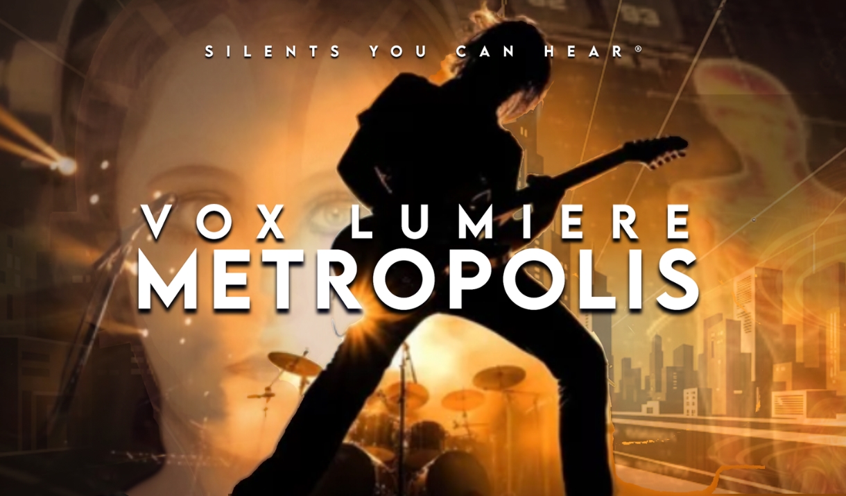 Vox Lumiere Metropolis poster with guitarist silhouette against glowing city backdrop.