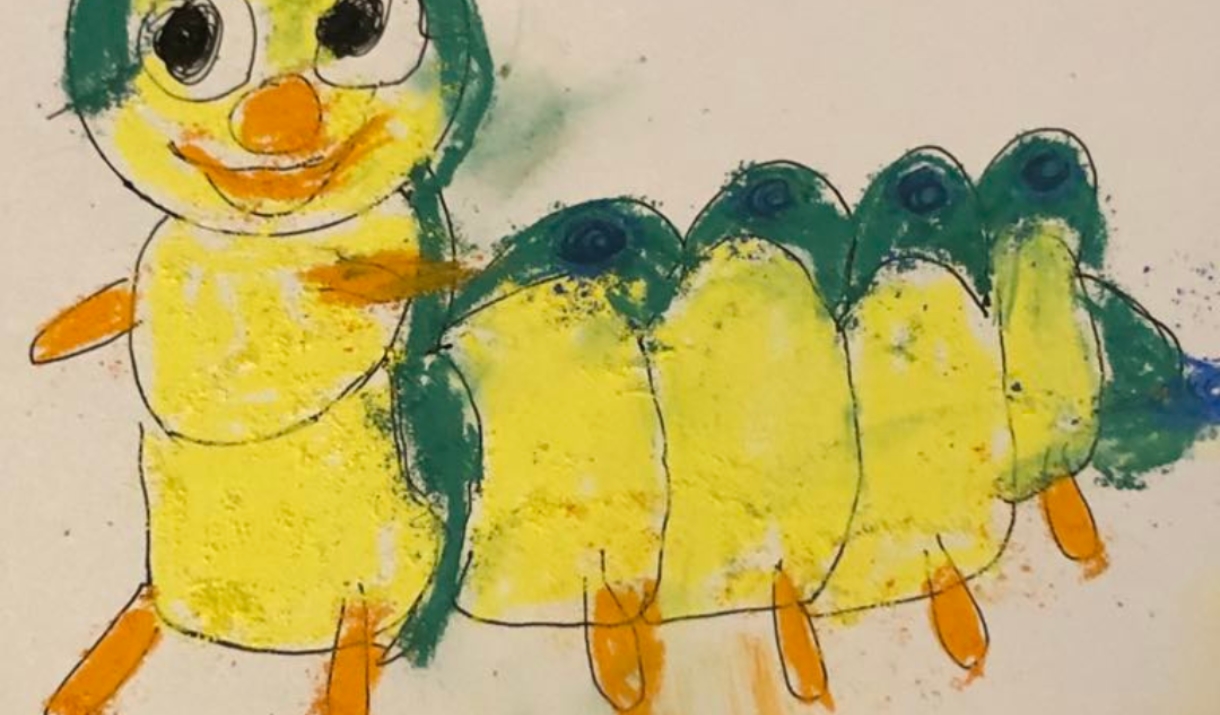 Childlike drawing of a yellow and green caterpillar with big eyes and orange legs.