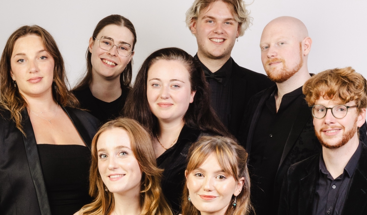 The Apex Singers all smiling