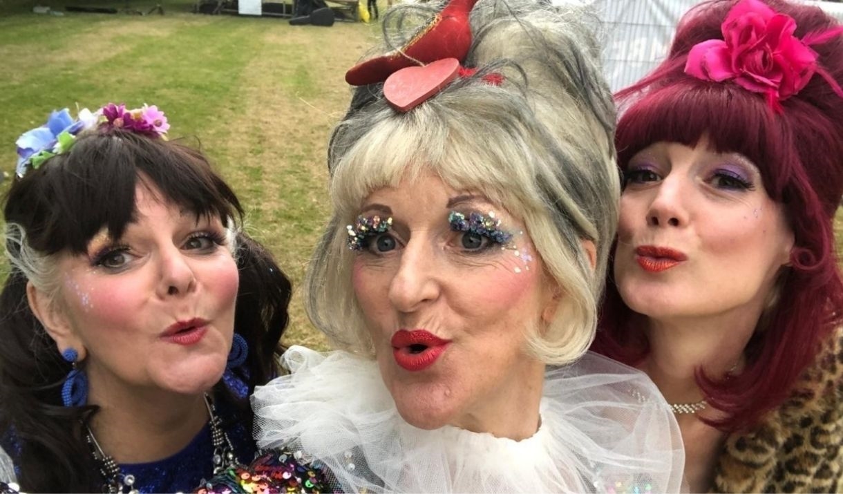 three ladies in eccentric makeup and costume