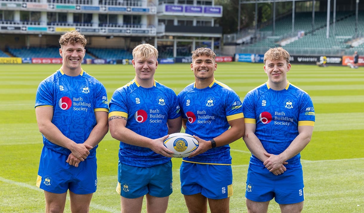 A picture of four University of Bath men's 1st XV players at The Recreation Ground, which is once again hosting the Anniversary Game in 2024