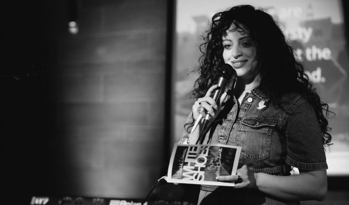 Palestinian poet Shahd Karaeen performing poetry