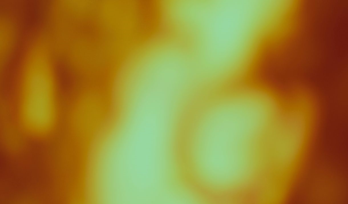 A blurry image of a woman with wavy hair in a warm colour pallet. Sparkfest logo in the top corner