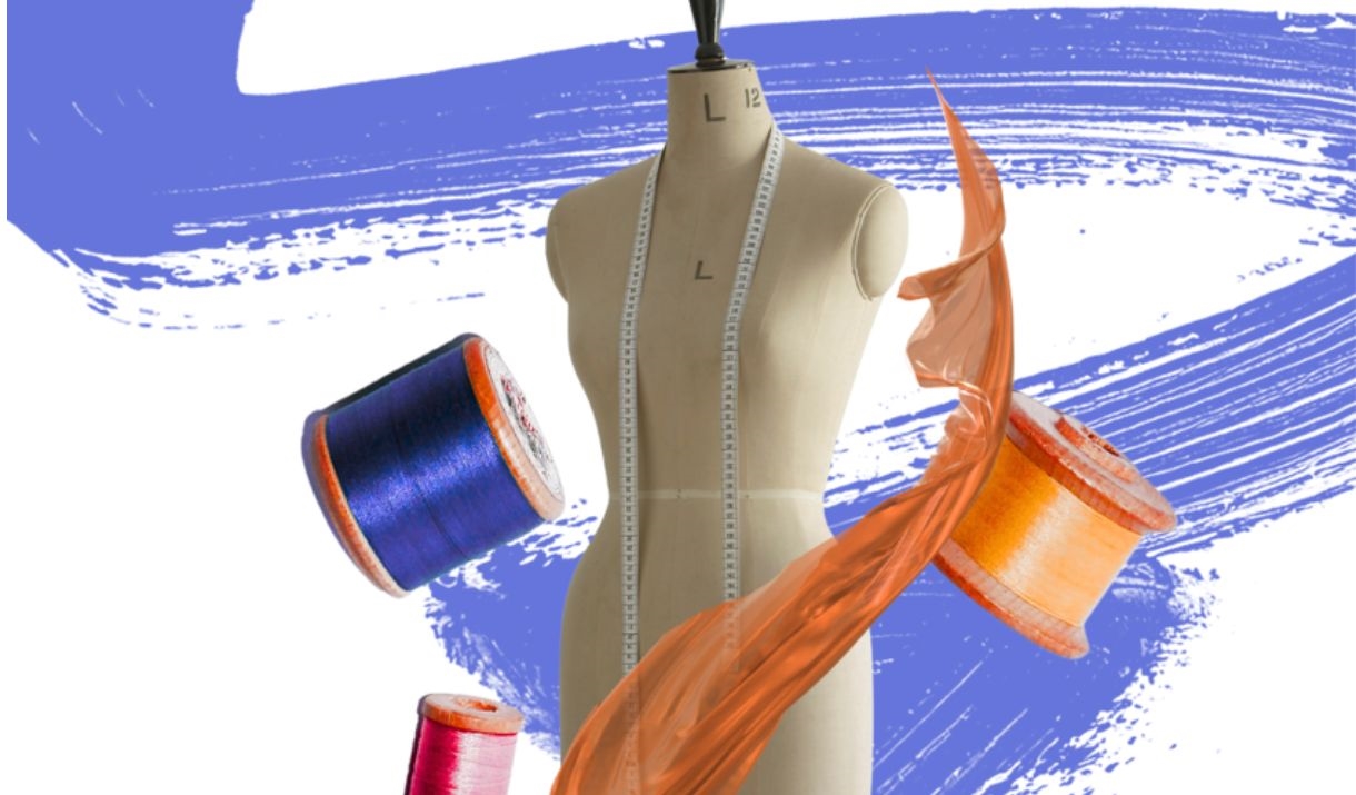 A tailors dummy/mannequin surrounded by ribbon.