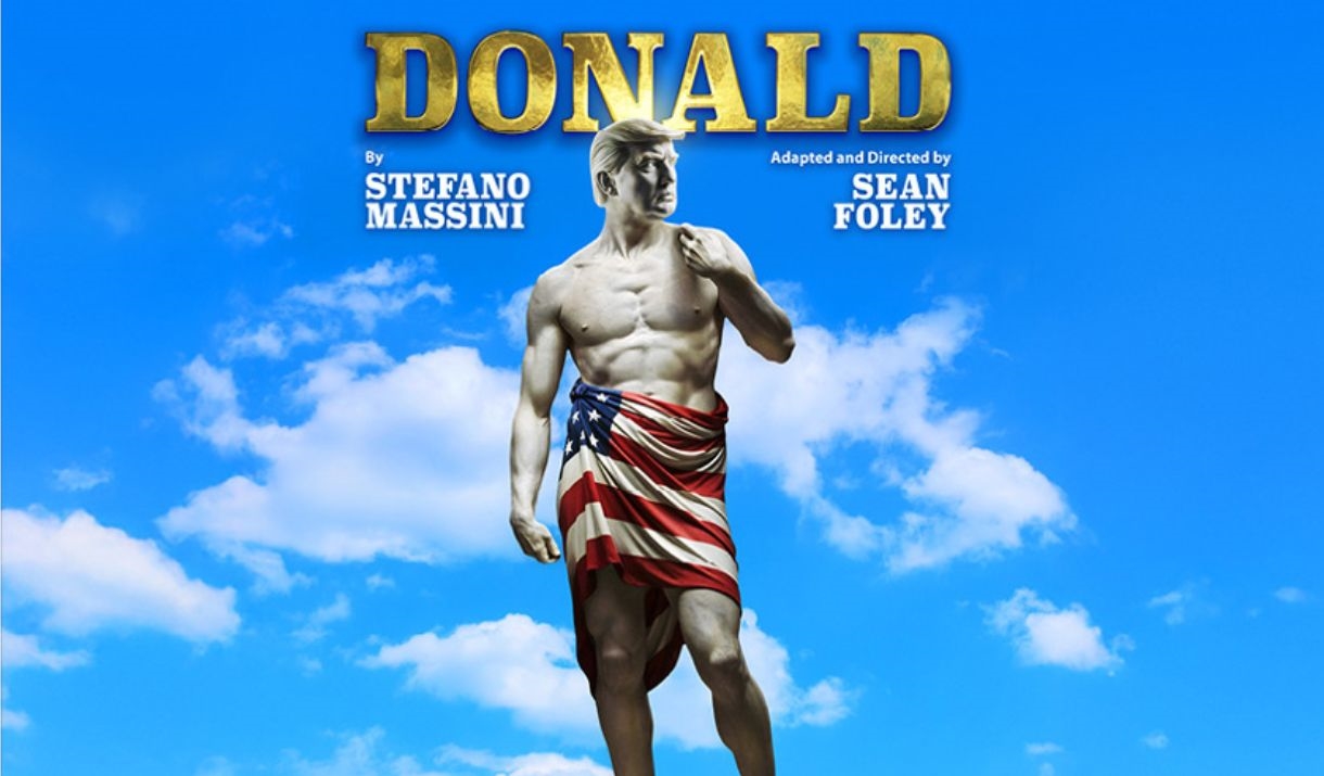 A statue of Donald Trump wrapped in an American flag.