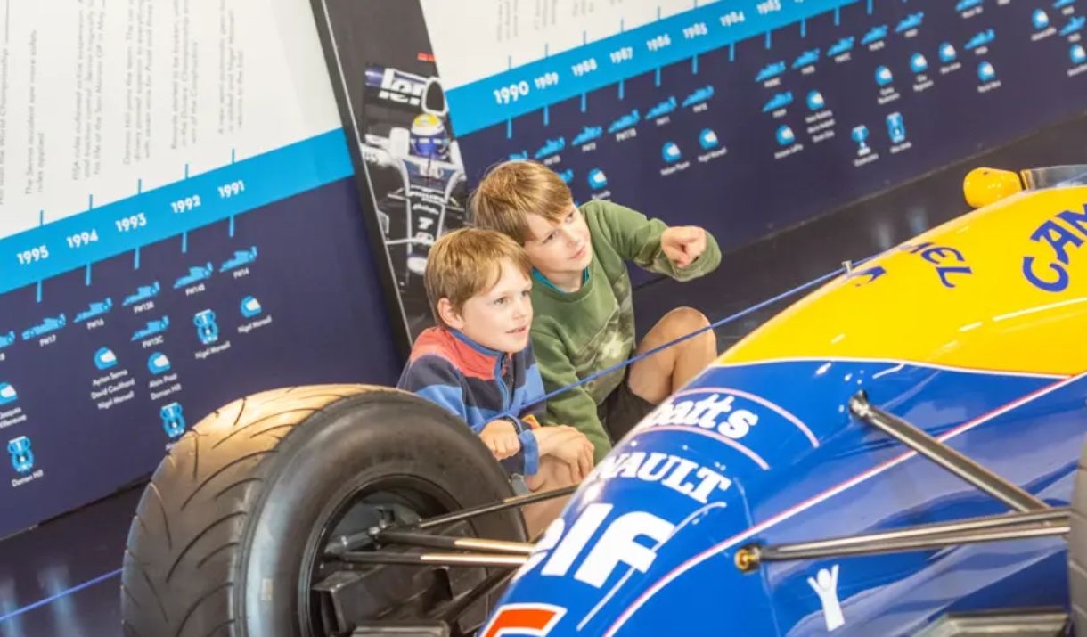 Childen with Formula 1 car at Haynes Motor Museum