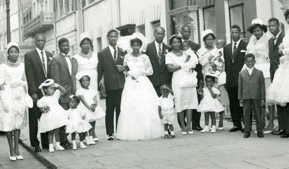 Stunning vintage black and white landscape image showing newly married couple Beryl & Bill Dixon with family & friends