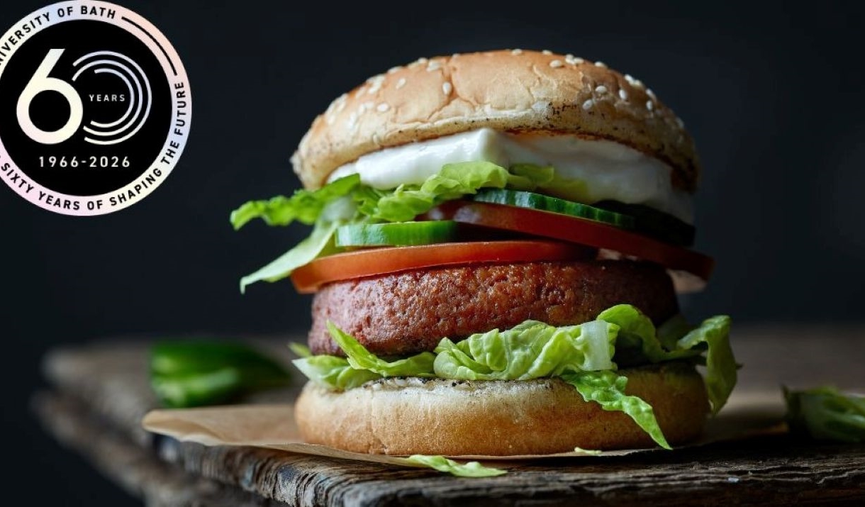 A burger made from cultivated meat in a bun with salad