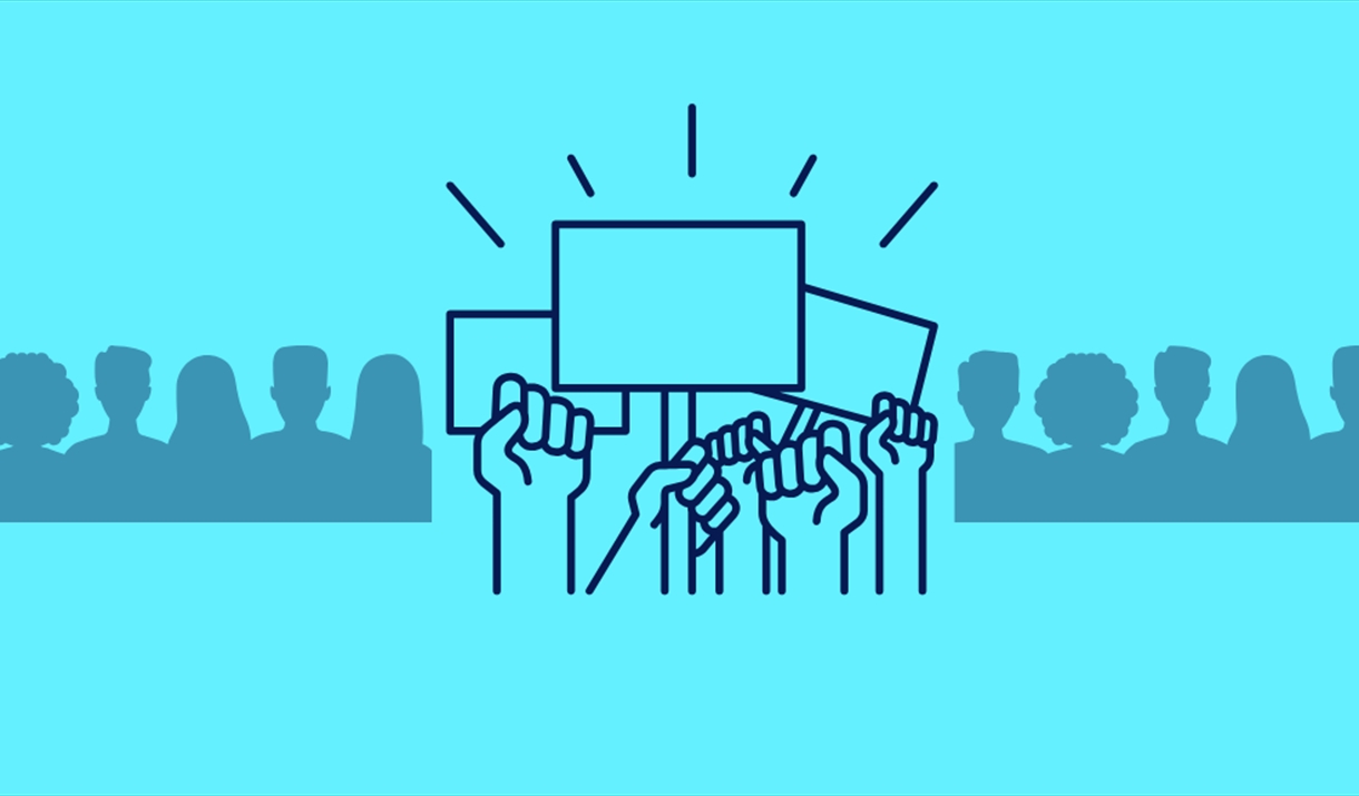 Icon of a group of hands holding up signs, with outlines of people either side.