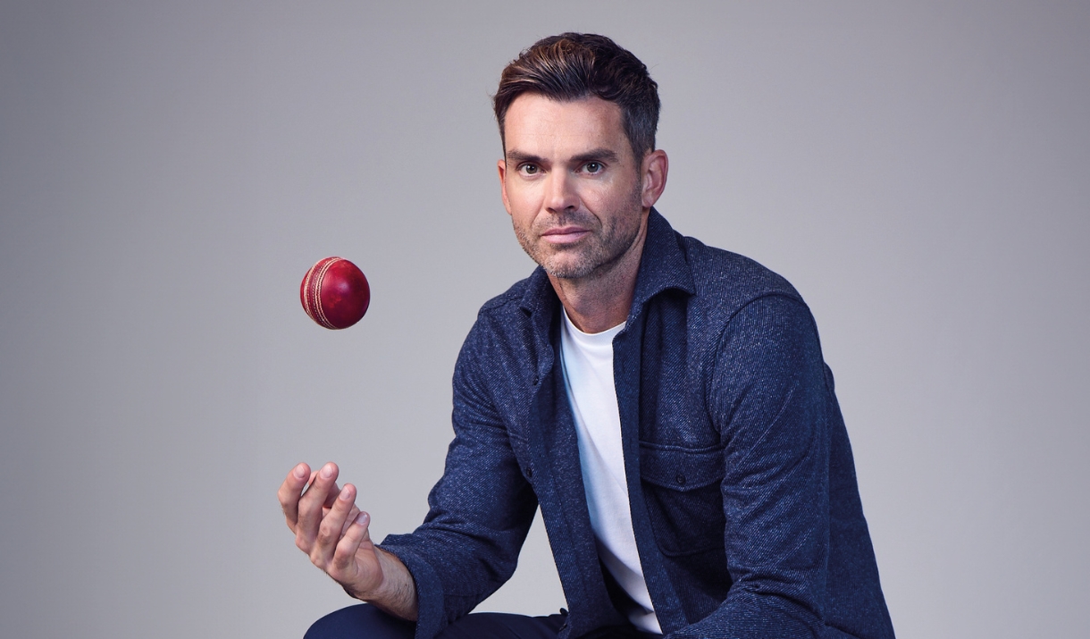 Jimmy Anderson throwing a cricket ball in the air