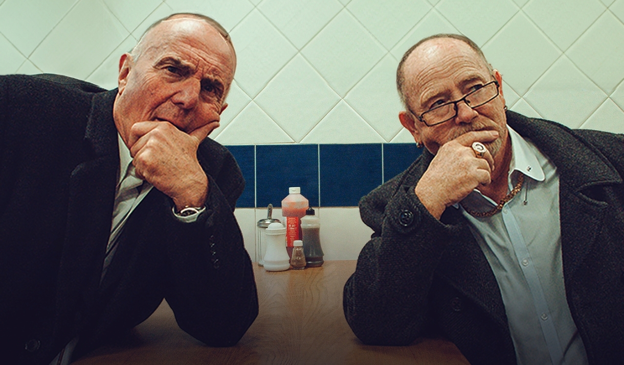 Pete & Bas sitting in a diner